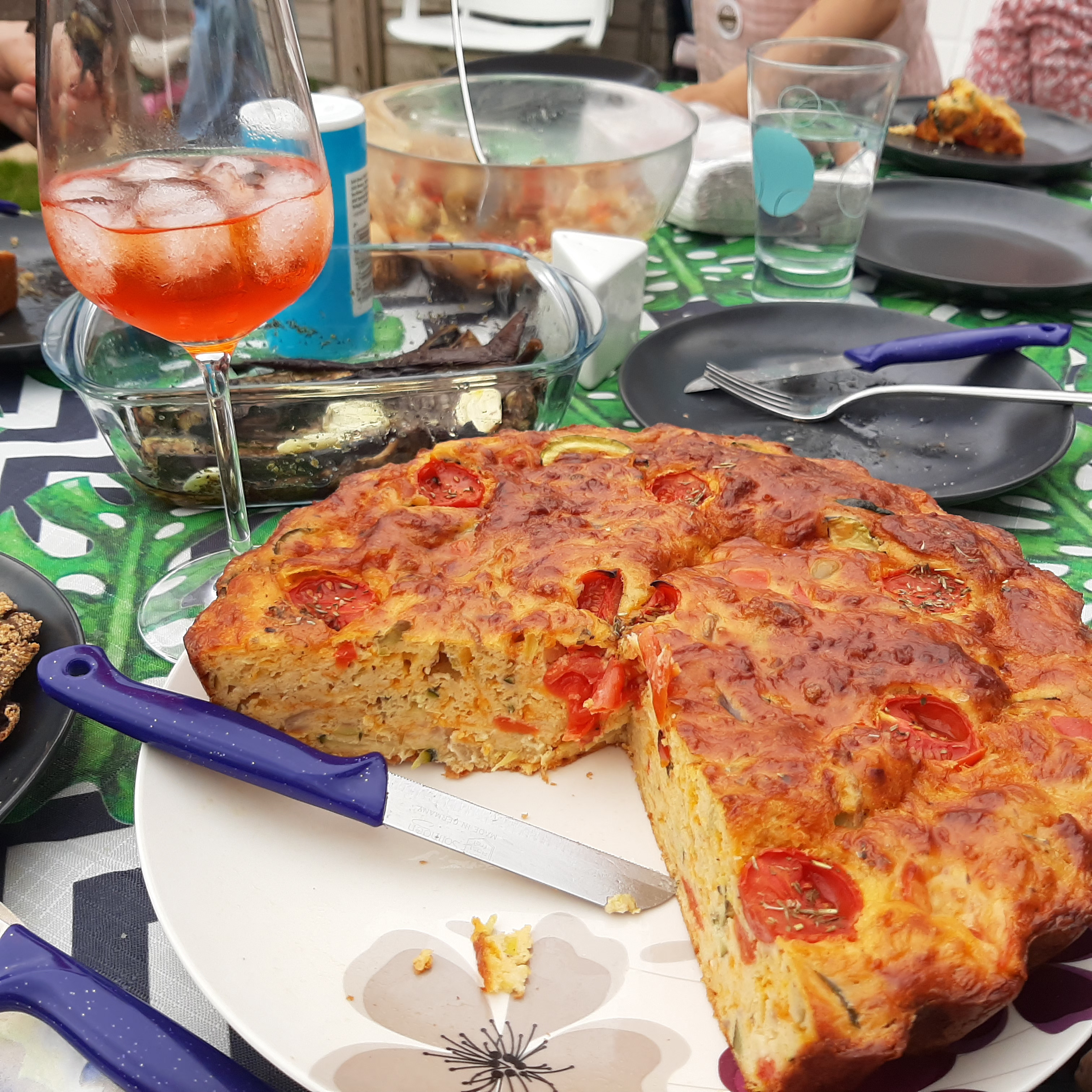 A homemade focaccia shared around the table